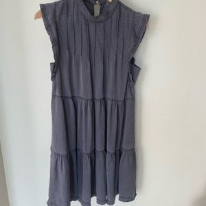Anthropologie washed black ruffled sleeveless mini dress.